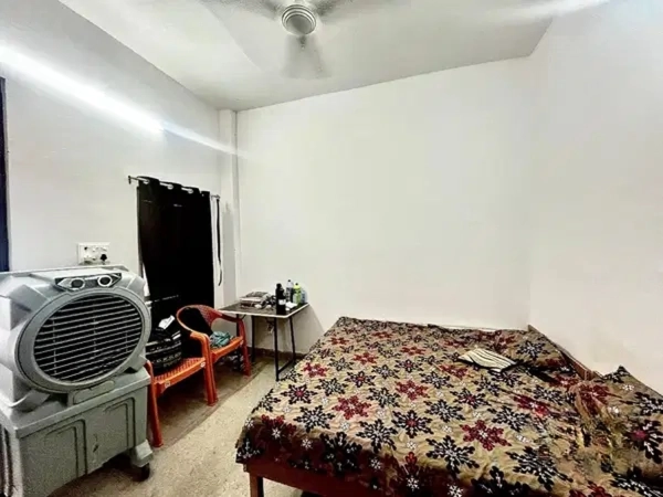 Double sharing room at Shiv PG House